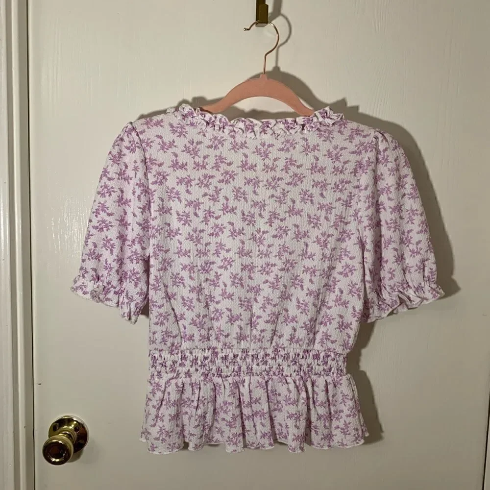Francesca’s NWT purple Andrea floral puff sleeve blouse Size XS